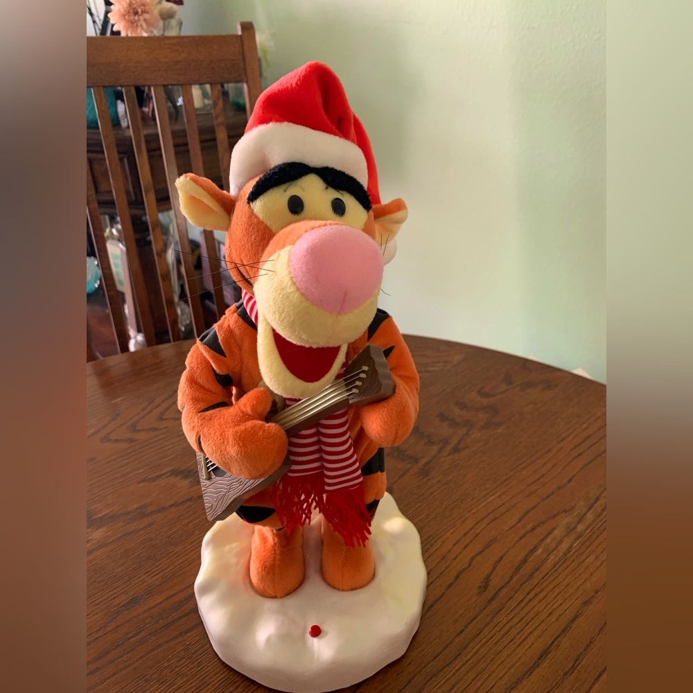 Animated Tigger with Guitar Singing “ Santa Claus Is Coming To Town”